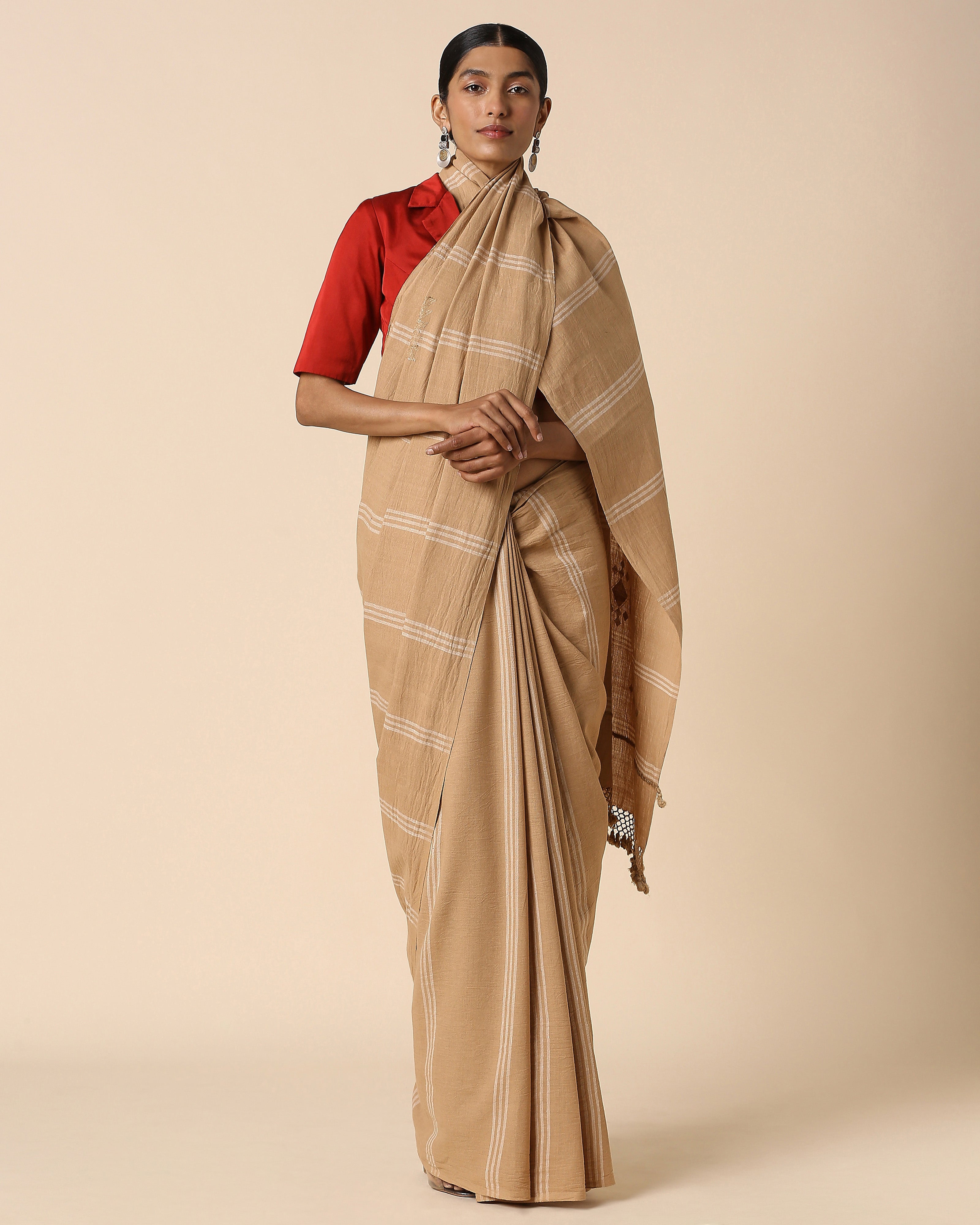 Dhivyathi Bhujodi Extra Weft Brown Cotton Saree